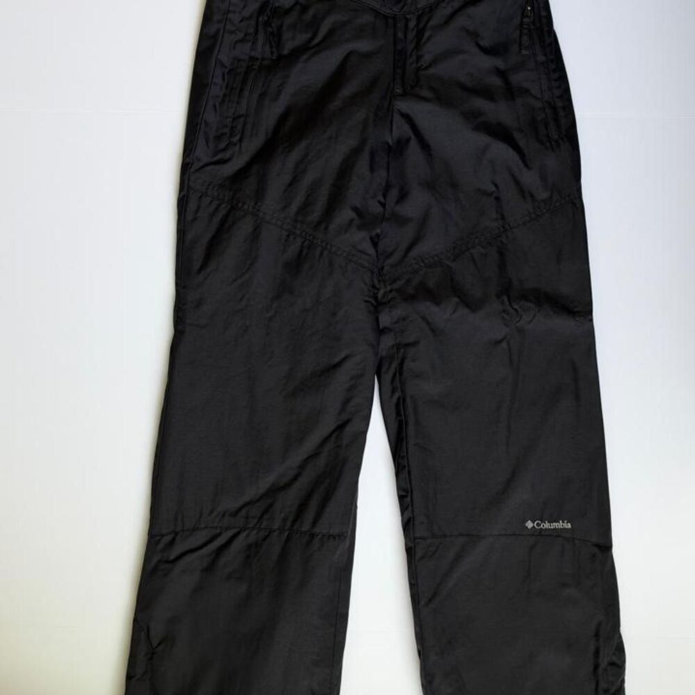 Youth Columbia black snow pants with adjustable waist and ankles. Size 14/16.